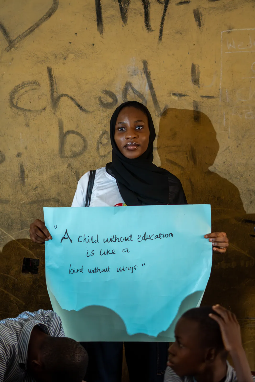 A student sharing a message about education
