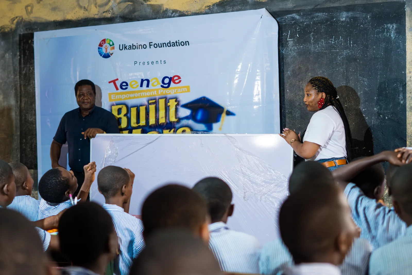 A speaker addressing students