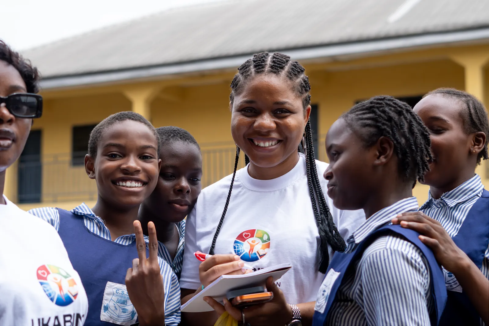 The founder with students